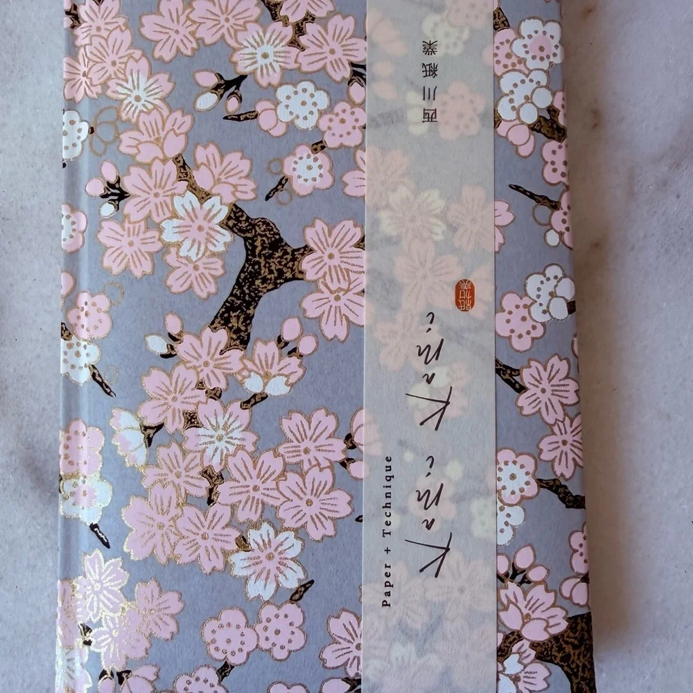 Japanese  notebook or journal featuring a cherry blossom (Sakura) pattern
